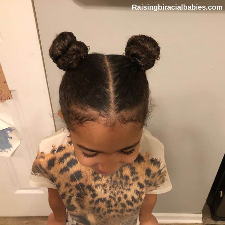 Space Buns with Wavy Curls — Winter Hairstyles for Black Kids