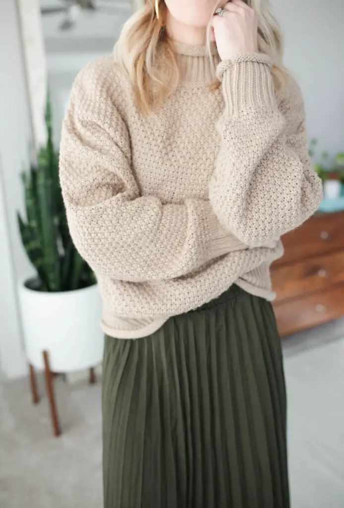 Textural Play: Beige Oversized Sweater with Pleated Midi Skirt Textural Play: Beige Oversized Sweater with Pleated Midi Skirt — Oversized Sweater Outfits