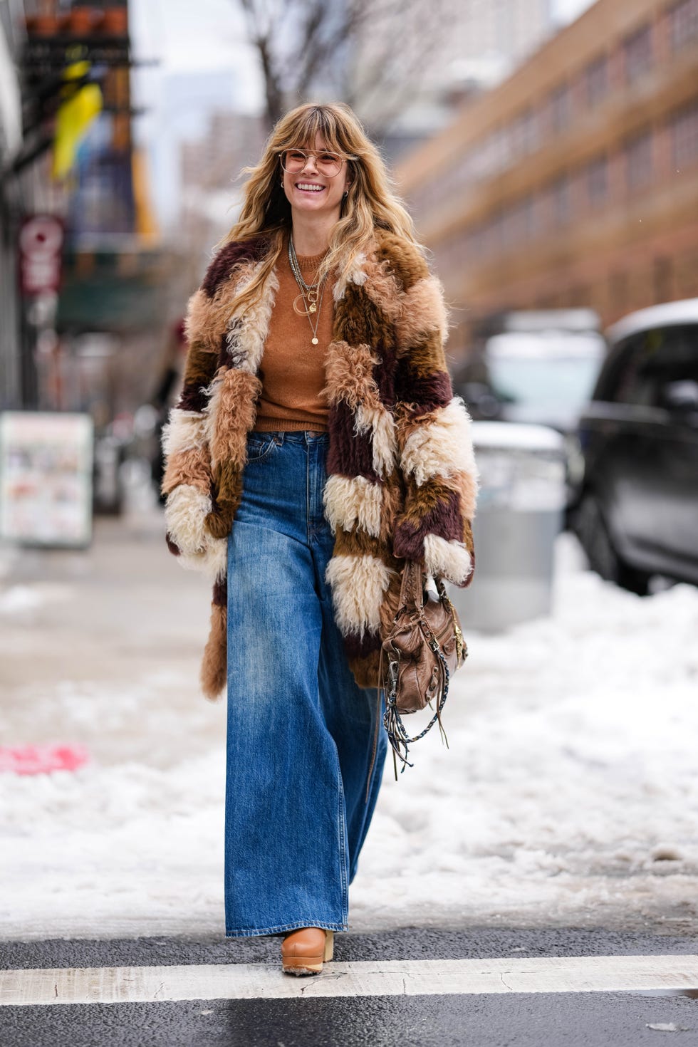 Patchwork Faux Fur Coat Over Knitwear and Wide-Leg Jeans Patchwork Faux Fur Coat Over Knitwear and Wide-Leg Jeans — NYC Winter Outfits