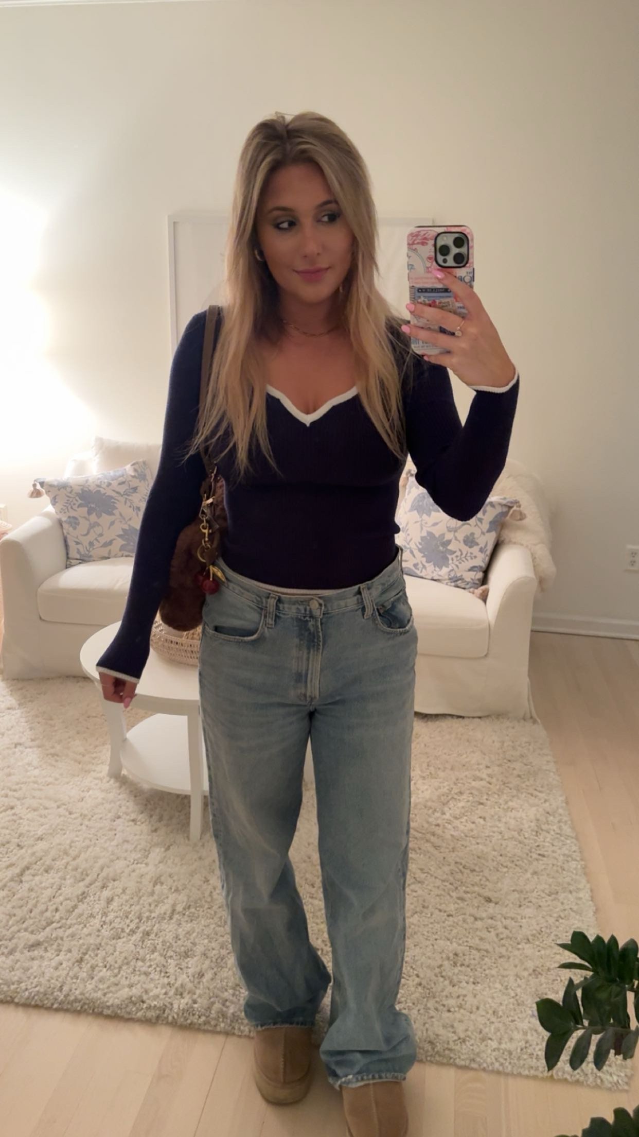 Navy V-Neck Sweater and Relaxed Jeans with Ugg-Style Slippers Navy V-Neck Sweater and Relaxed Jeans with Ugg-Style Slippers — Comfy Winter Outfits