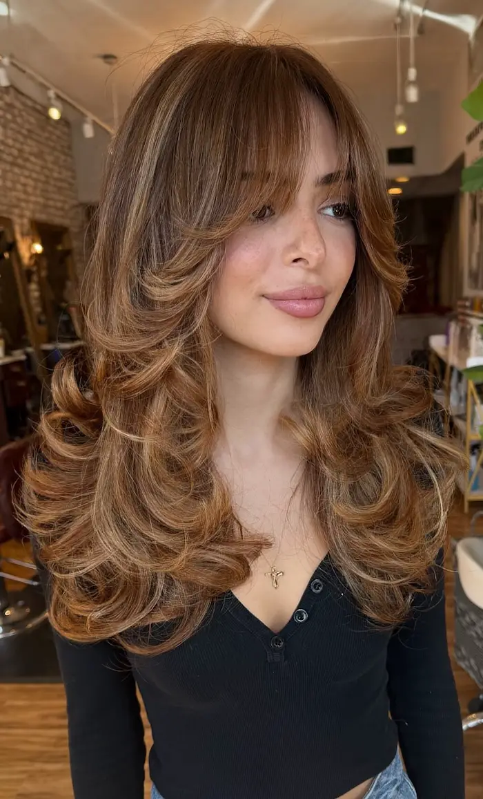 Long Feathered Layers With Curtain Bangs Long Feathered Layers With Curtain Bangs — Winter Haircuts with Curtain Bangs