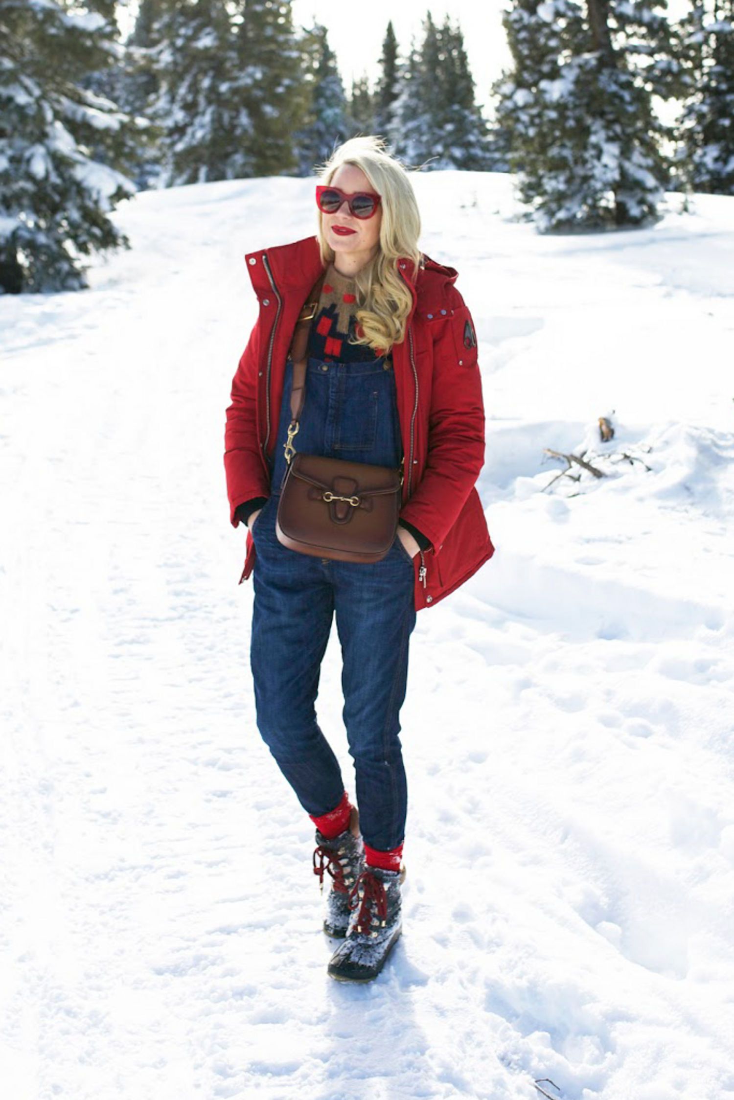 Vibrant Red Puffer Coat Over Denim Overalls Vibrant Red Puffer Coat Over Denim Overalls — Deep Winter Outfits