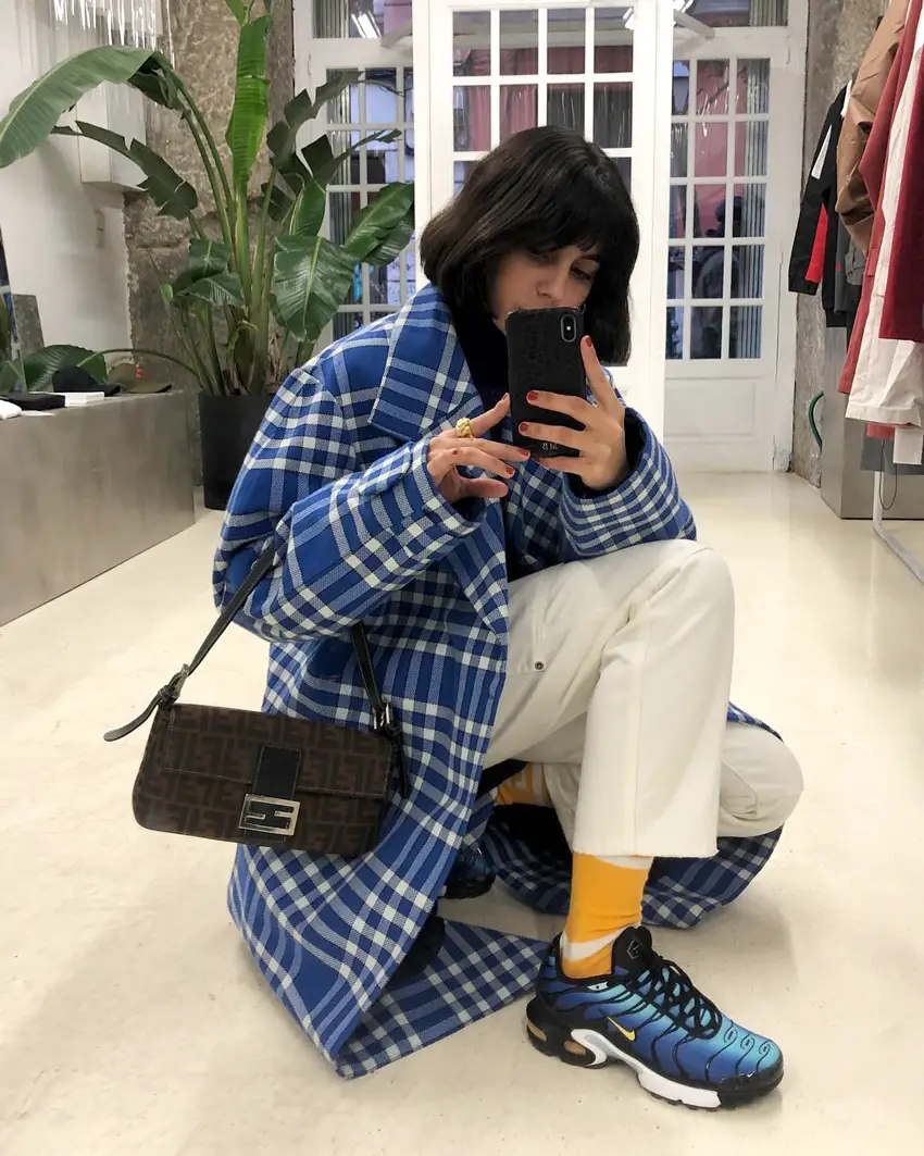 Bold Plaid Coat with Blue Sneakers and Contrasting Accessories Bold Plaid Coat with Blue Sneakers and Contrasting Accessories — Winter Outfits with Sneakers