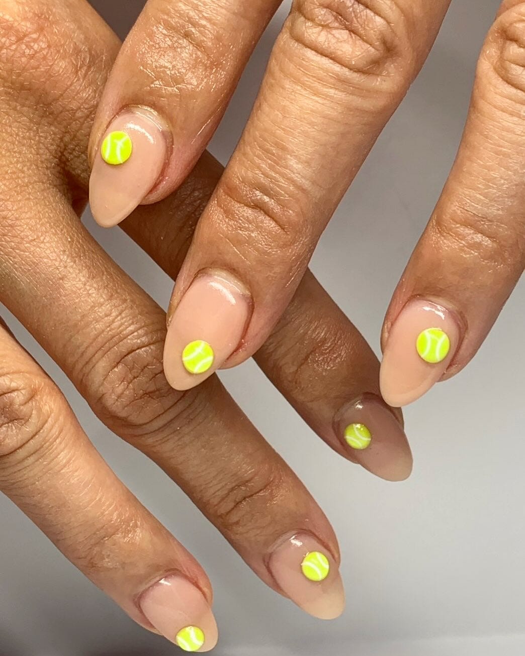 Subtle Tennis Ball Decals on Nude Subtle Tennis Ball Decals on Nude — Yellow Nail Designs