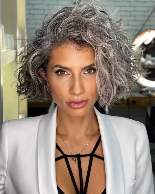 Short Salt and Pepper Shag With Wispy Bangs — Winter Haircuts for Women Over 40