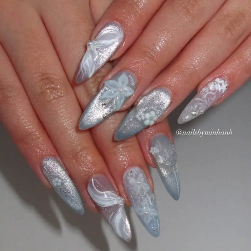 Light Blue Frosty Floral Stilettos Light Blue Frosty Floral Stilettos — Long Winter Nails