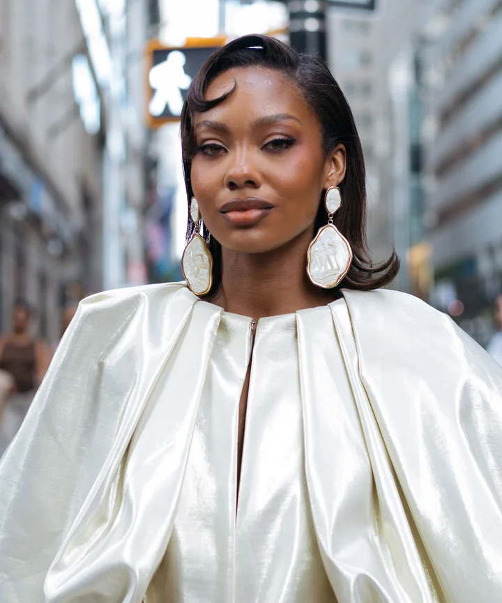 Sleek Dark Bob with Dramatic Sleeves and Drop Earrings Sleek Dark Bob with Dramatic Sleeves and Drop Earrings — Trendy Haircuts for Women