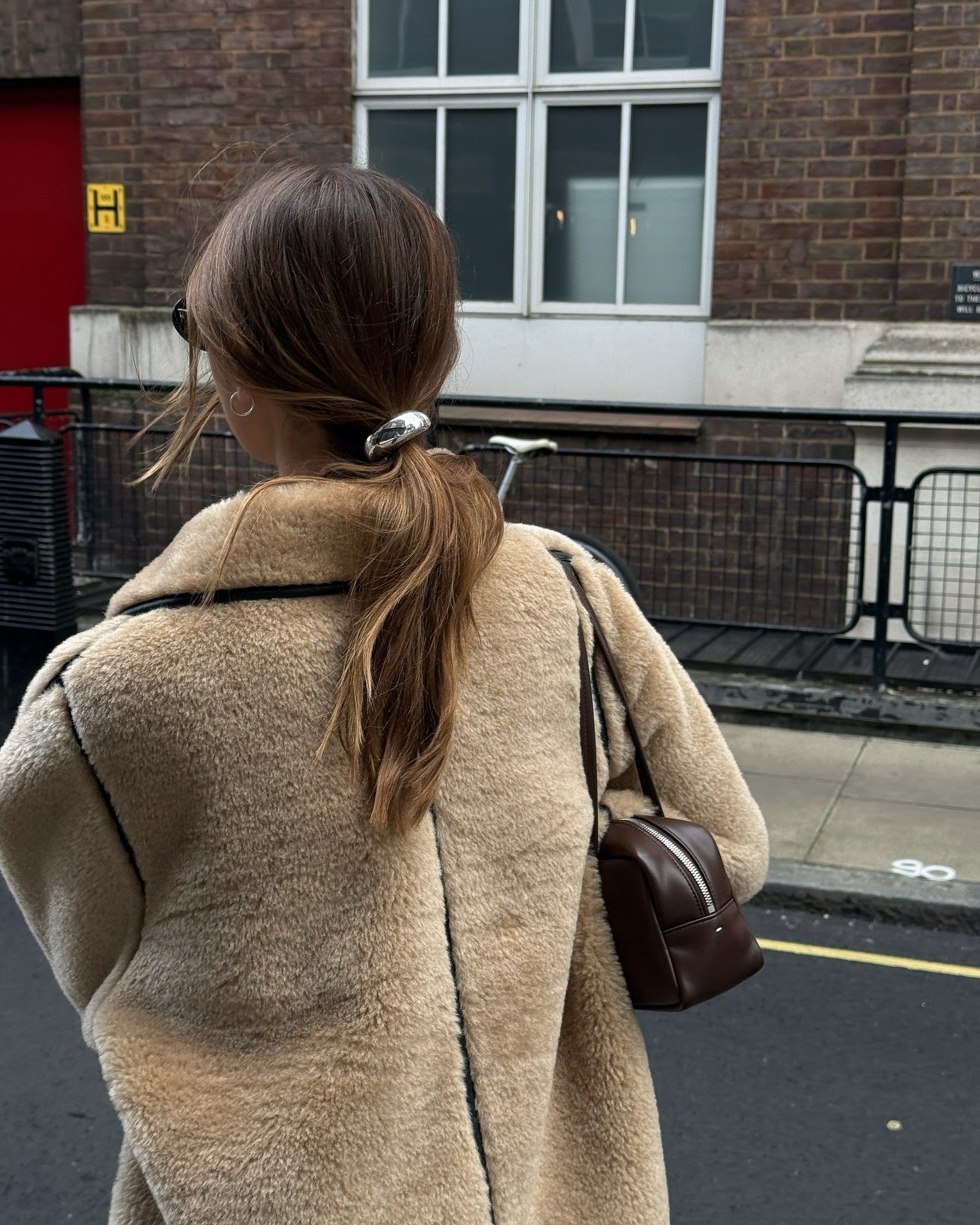 Low Ponytail With Elegant Accessory — Cute Winter Hairstyles