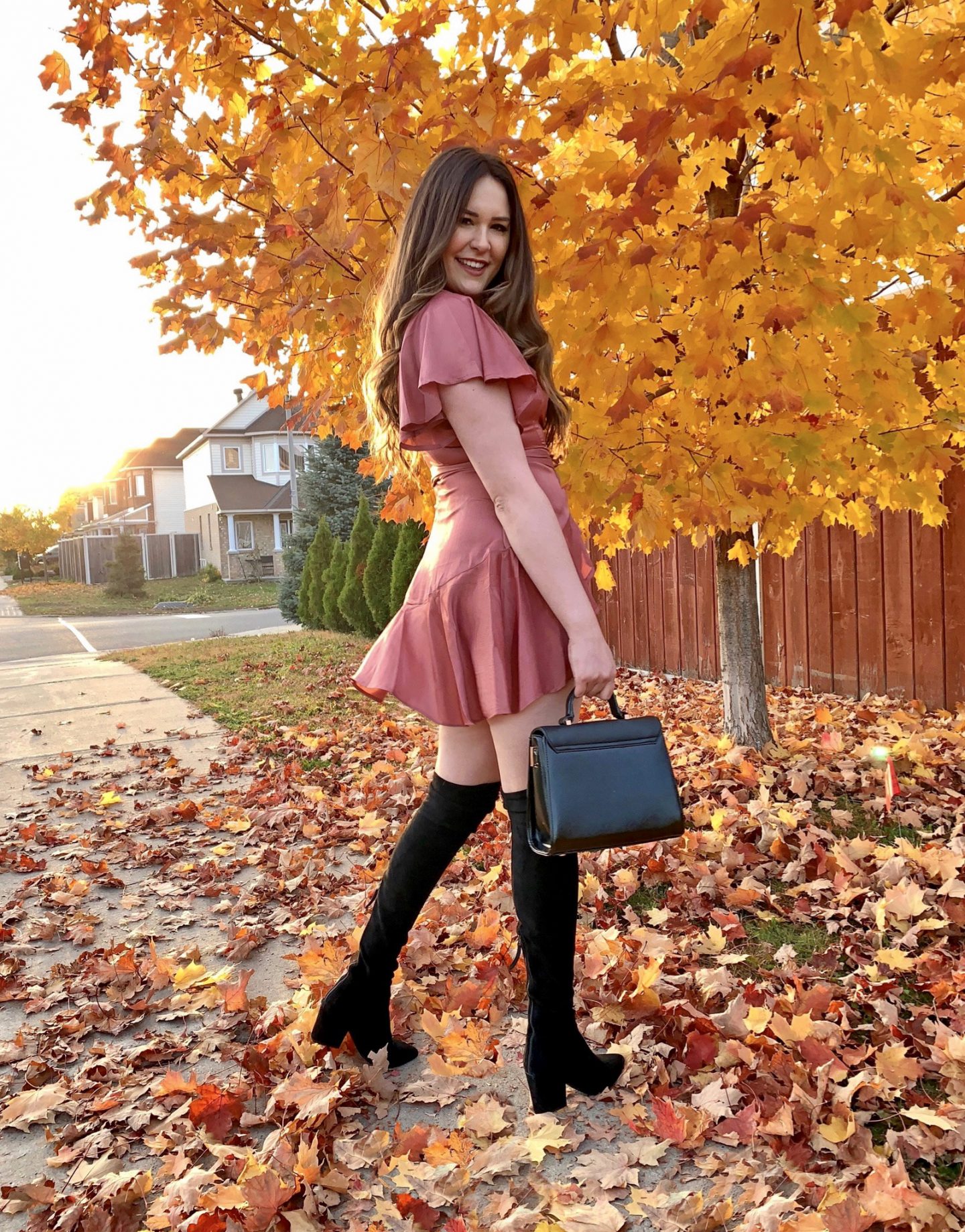 Pink Mini Dress with Black Suede Over-the-Knee Boots — She Carries A Black Handbag Pink Mini Dress with Black Suede Over-the-Knee Boots — She Carries A Black Handbag — Over the Knee Boots Outfits