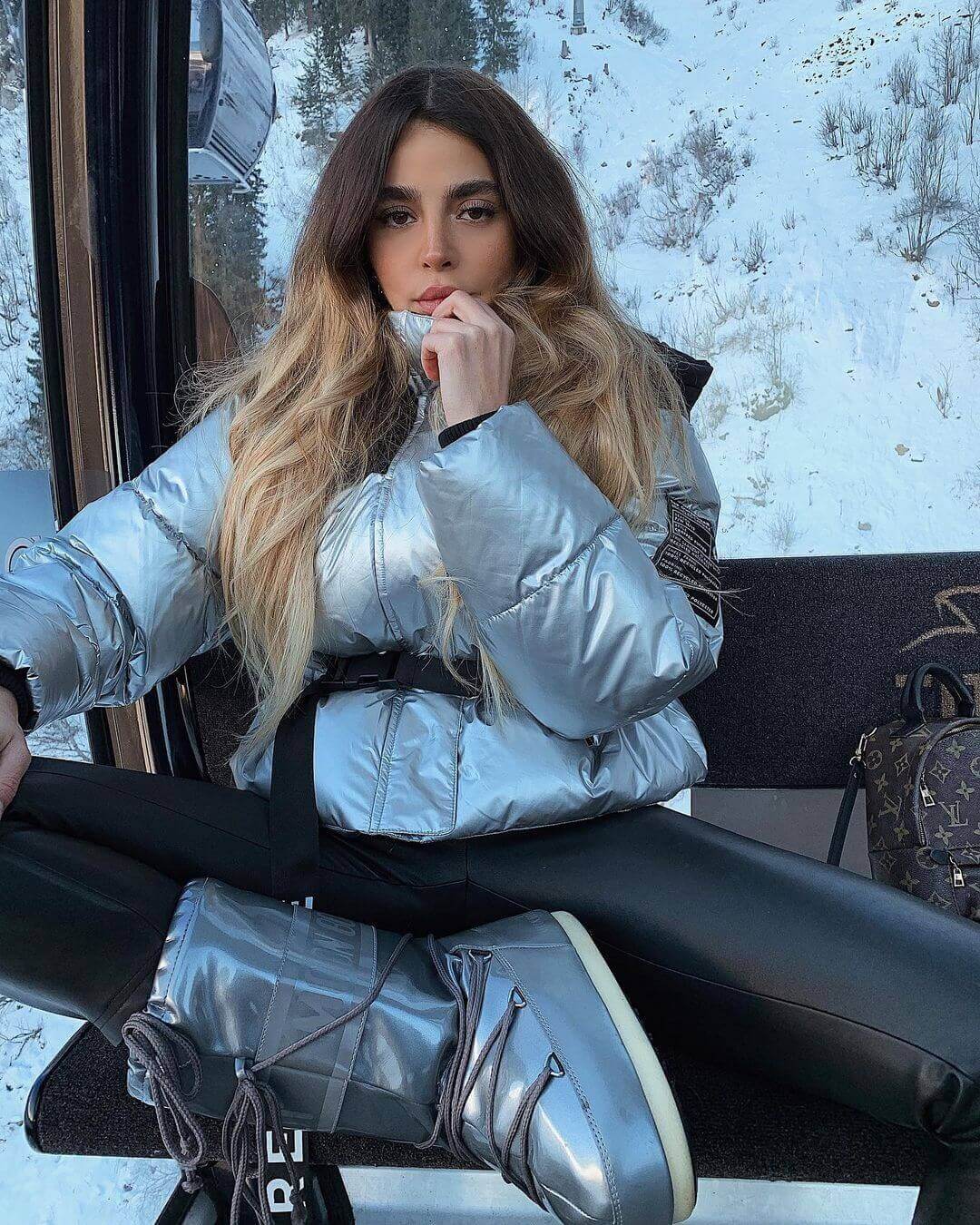 Futuristic Silver Moon Boots with Metallic Puffer Jacket Futuristic Silver Moon Boots with Metallic Puffer Jacket — Moon Boots Outfits