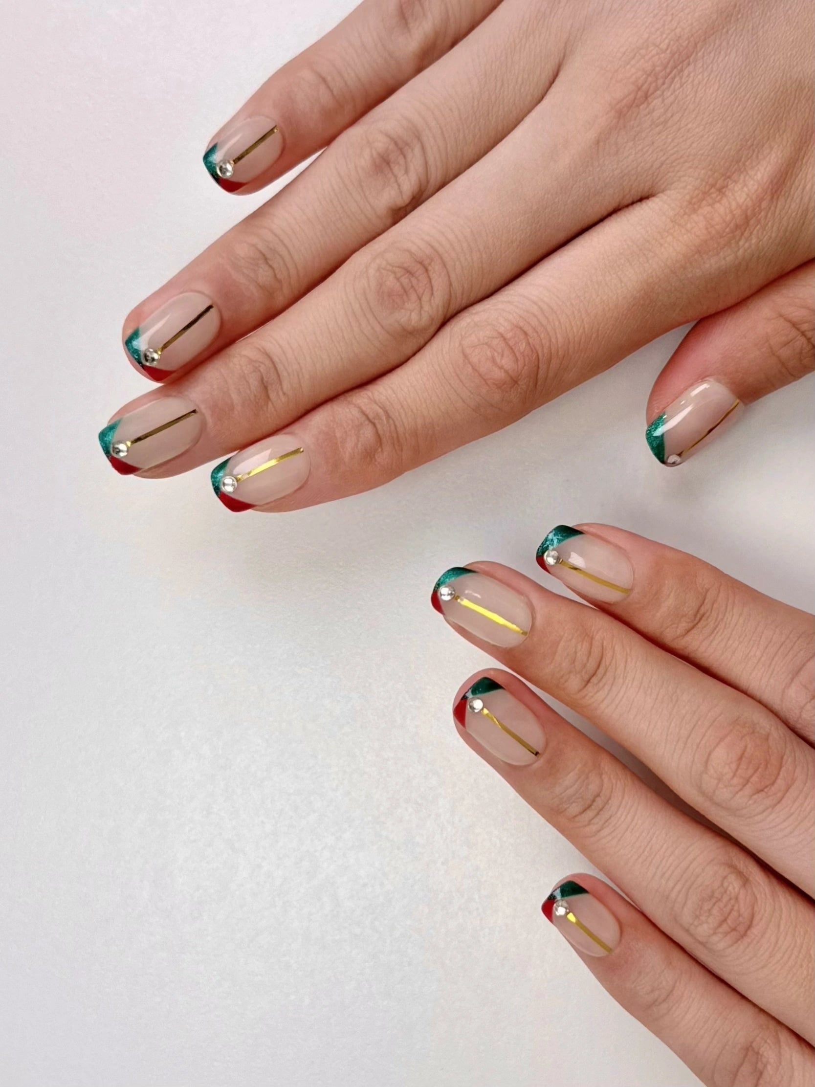 Christmas French Tips with Foil Accents Christmas French Tips with Foil Accents — Short Winter Square Nails