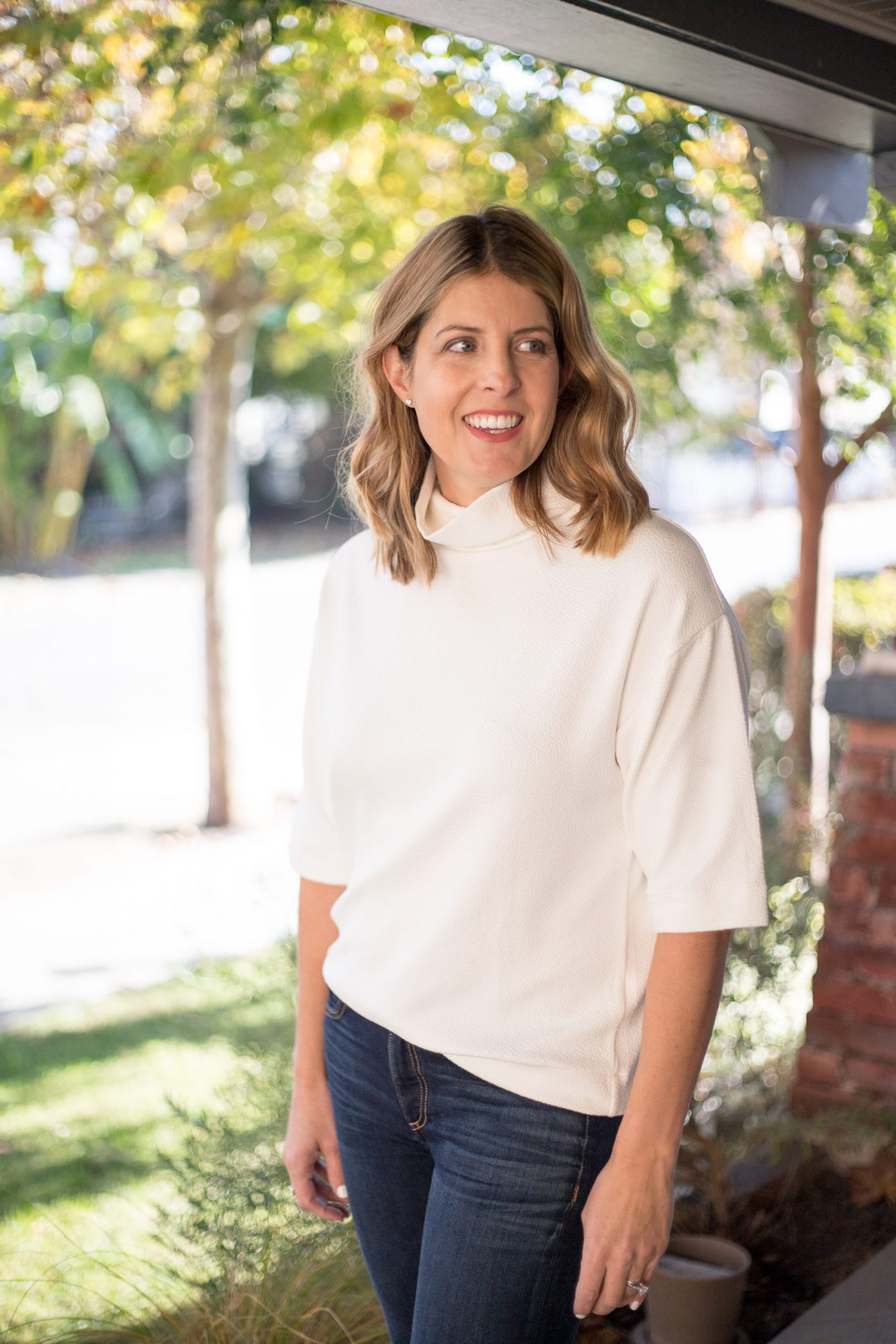 White Textured Short-Sleeve Turtleneck Top with Blue Denim Jeans White Textured Short-Sleeve Turtleneck Top with Blue Denim Jeans — Turtleneck Outfits