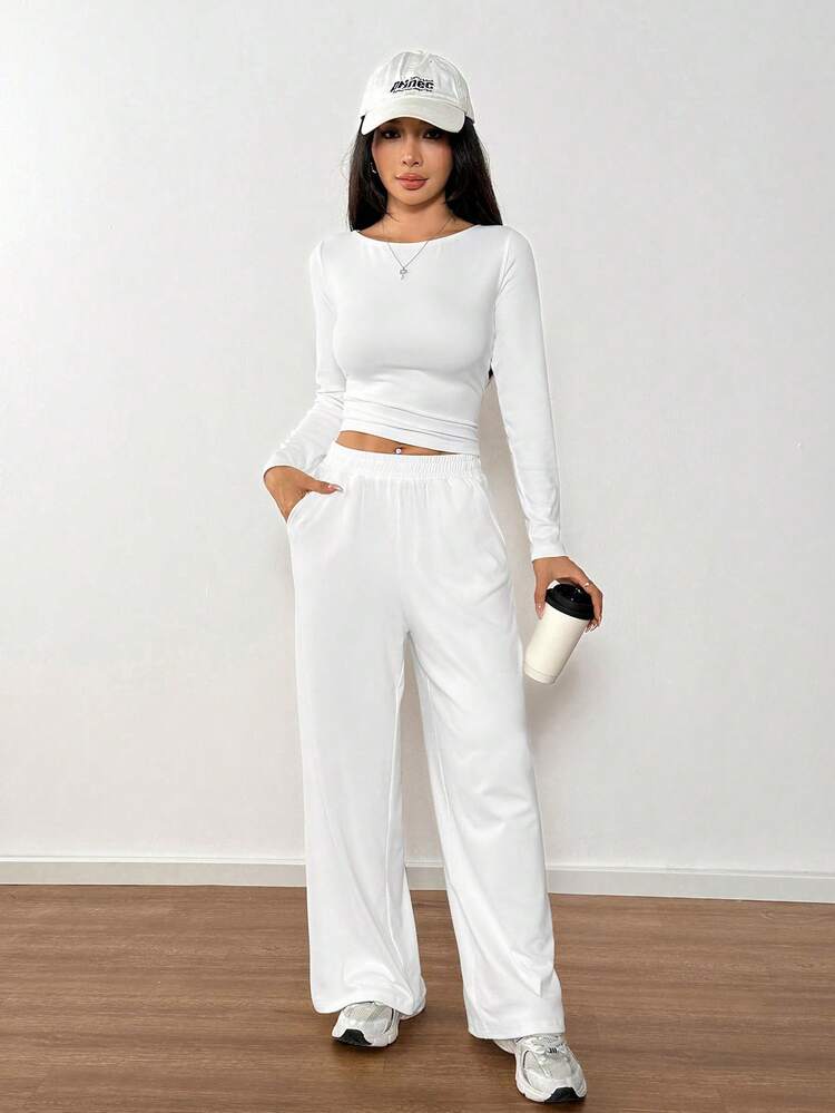 Chic Monochromatic Grey Sweater and Trousers — Winter Outfits for Petite Women