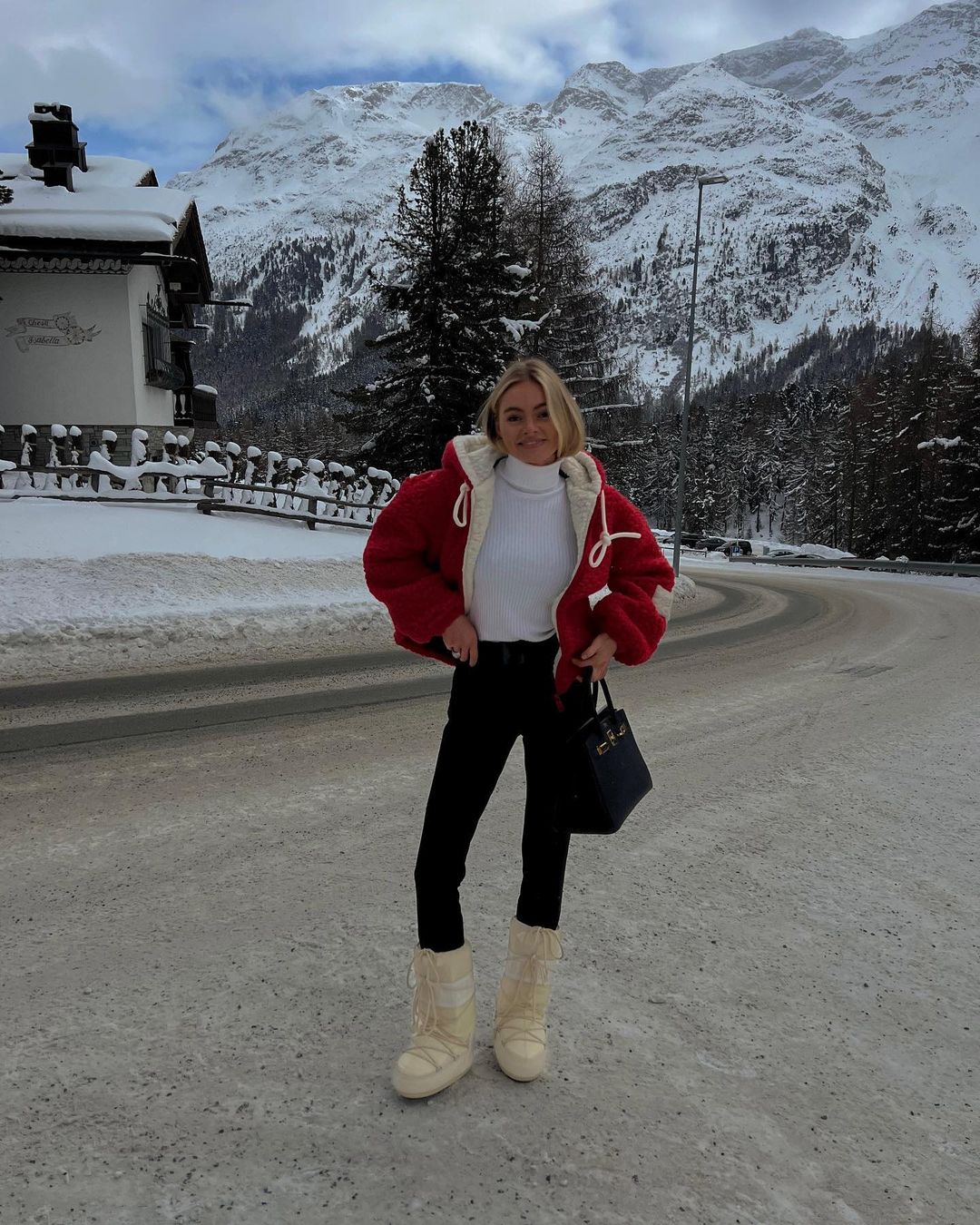 Red Puffer Jacket and Snow Boots for a Snowy Destination — Winter Travel Outfits