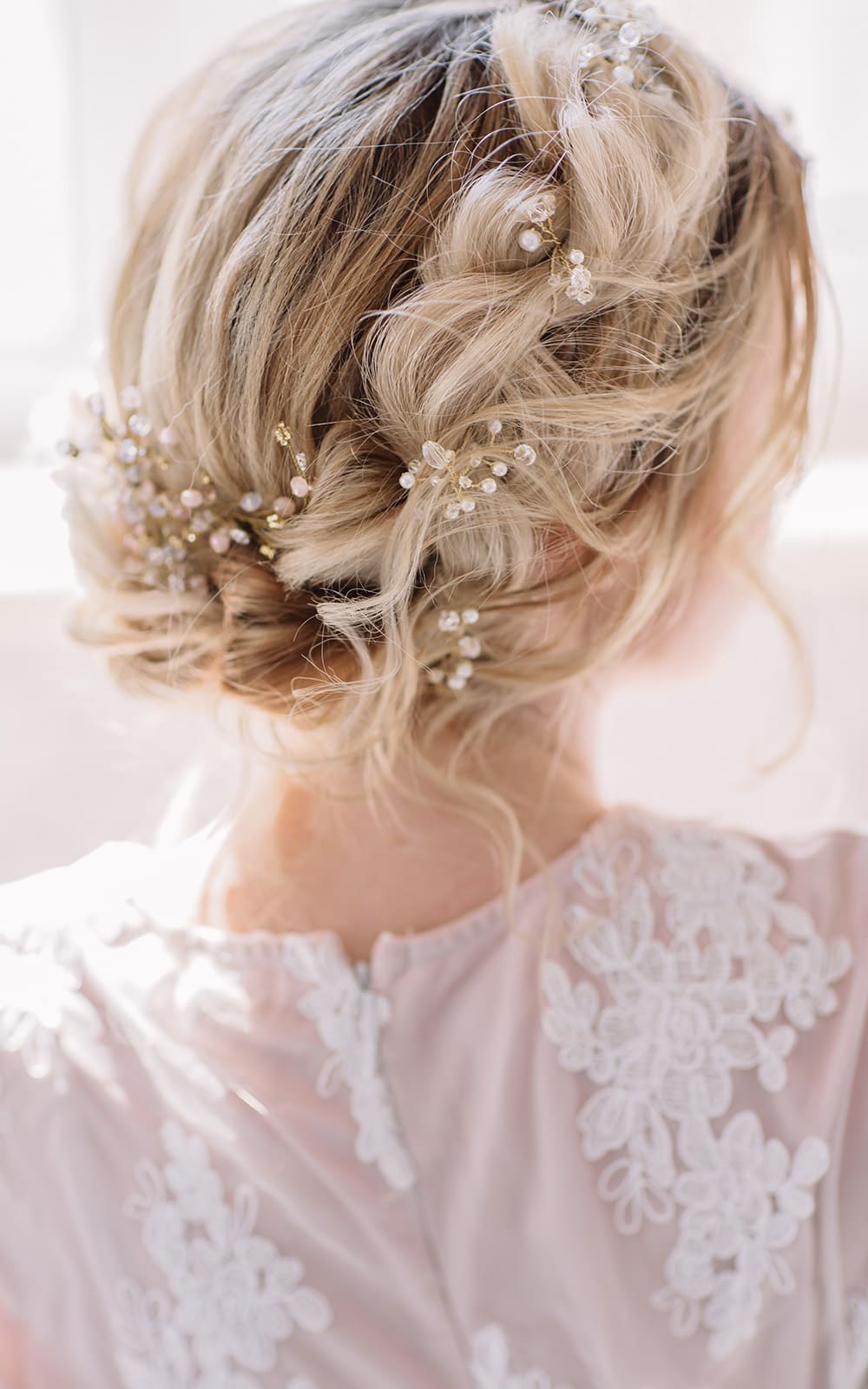 Platinum Blonde Braided Updo With Pearls Platinum Blonde Braided Updo With Pearls — Winter Wedding Hairstyles