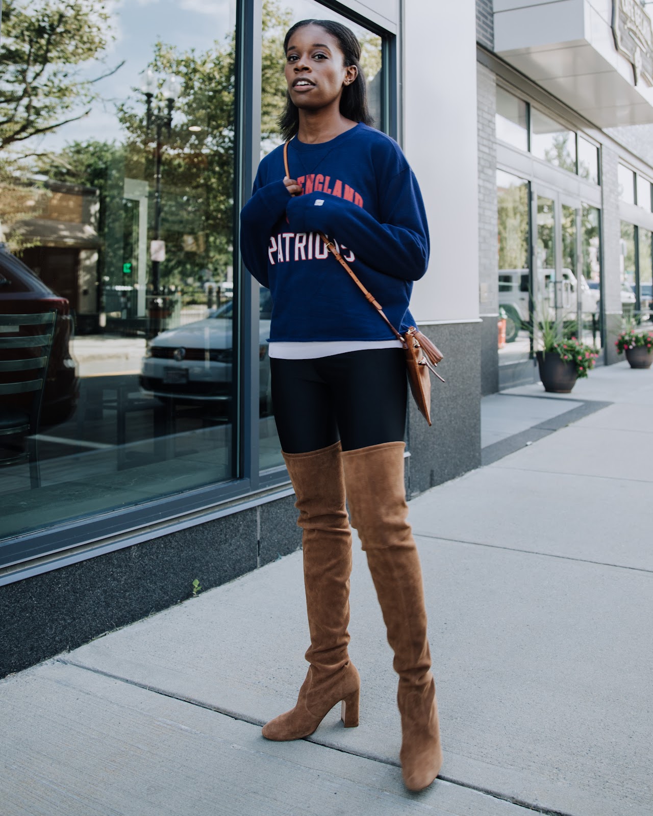 Graphic Sweatshirt and Over-the-Knee Boots for Team Spirit Graphic Sweatshirt and Over-the-Knee Boots for Team Spirit — Winter Tailgate Outfits