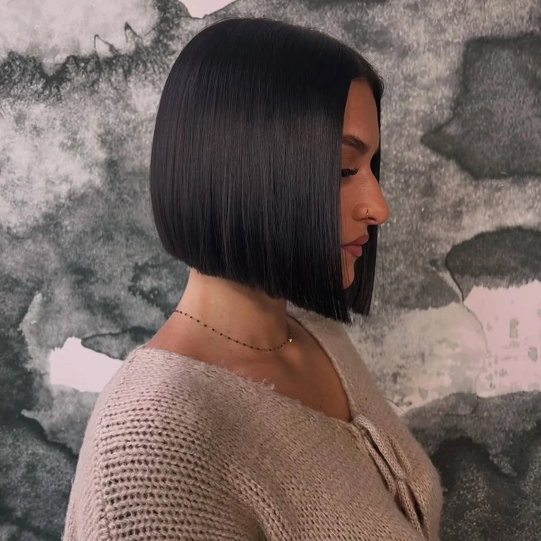 Near-black side-profile bob with smooth angled edge
