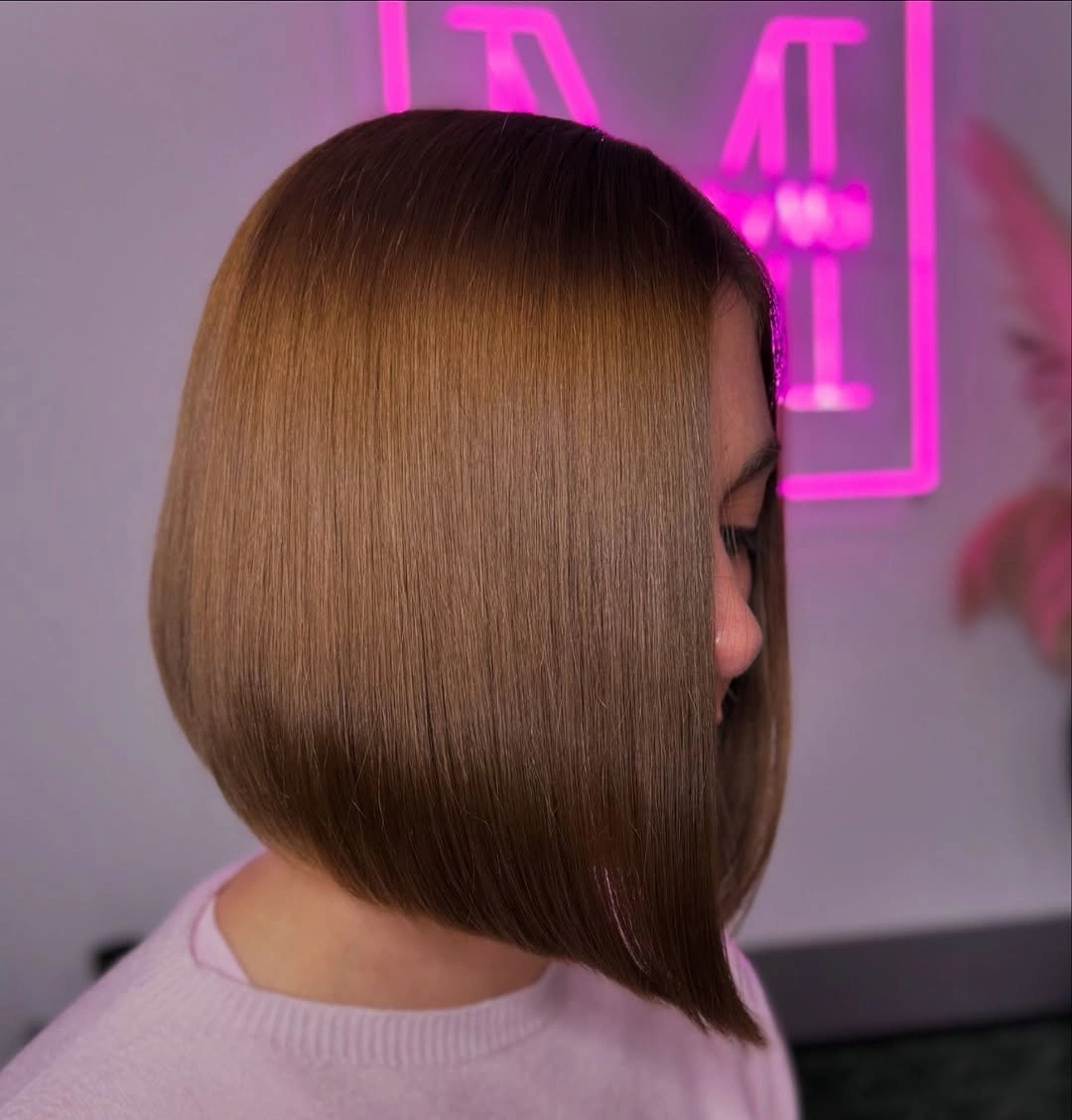 Warm brown angled bob with rounded back and long front