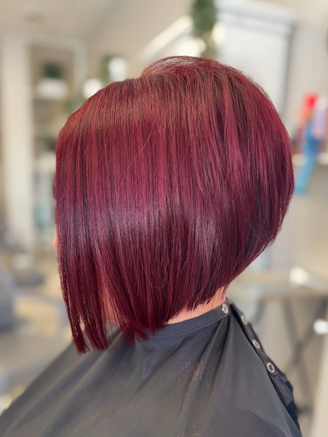 Burgundy bob with shorter back and longer front pieces