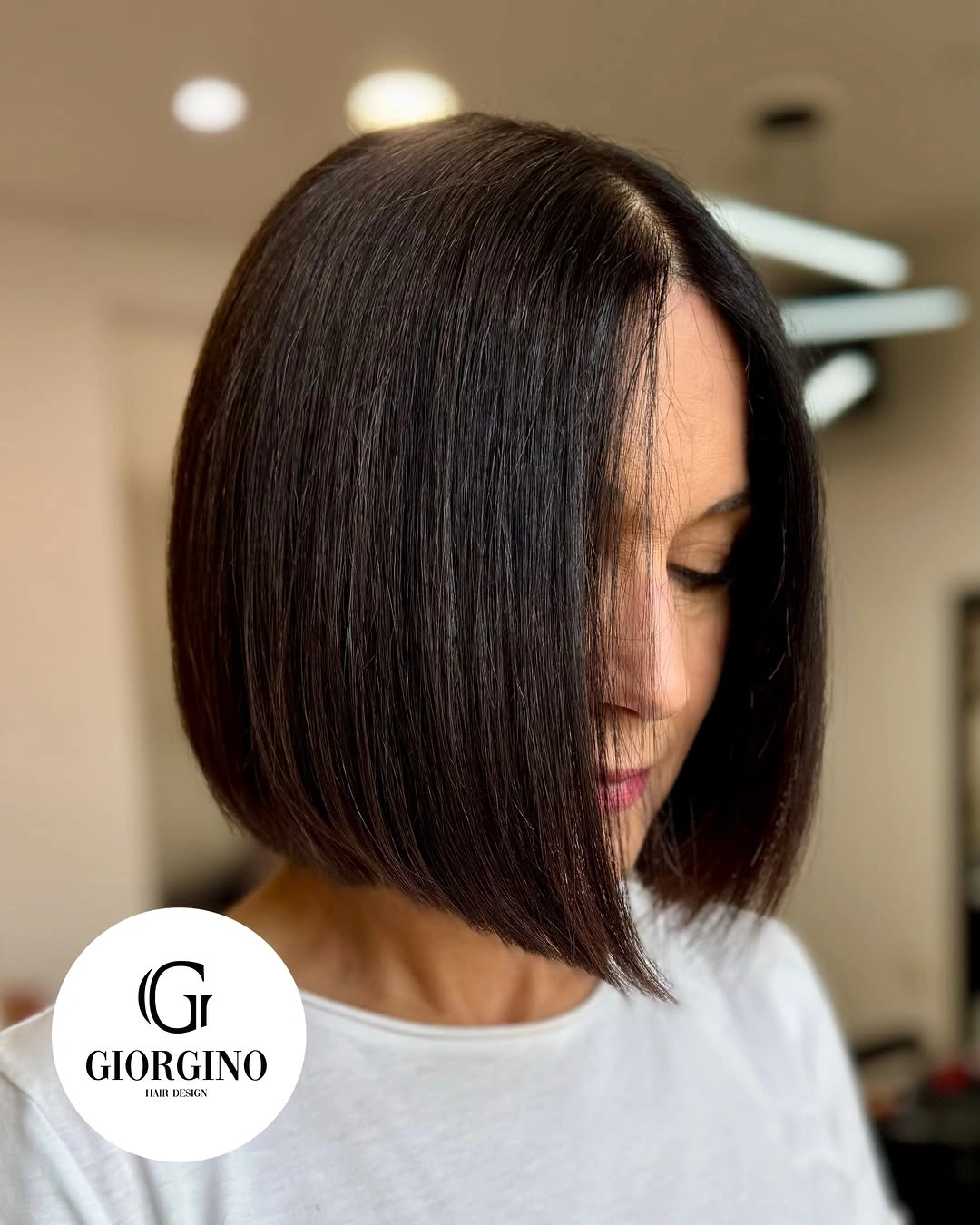 Dark brunette bob with long front and smooth side