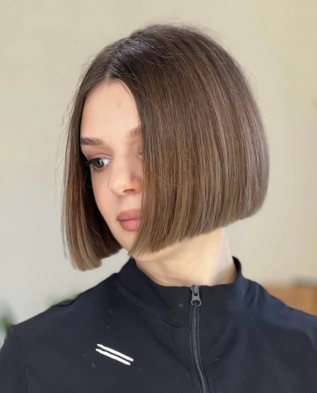Medium brown bob with center part and rounded sides