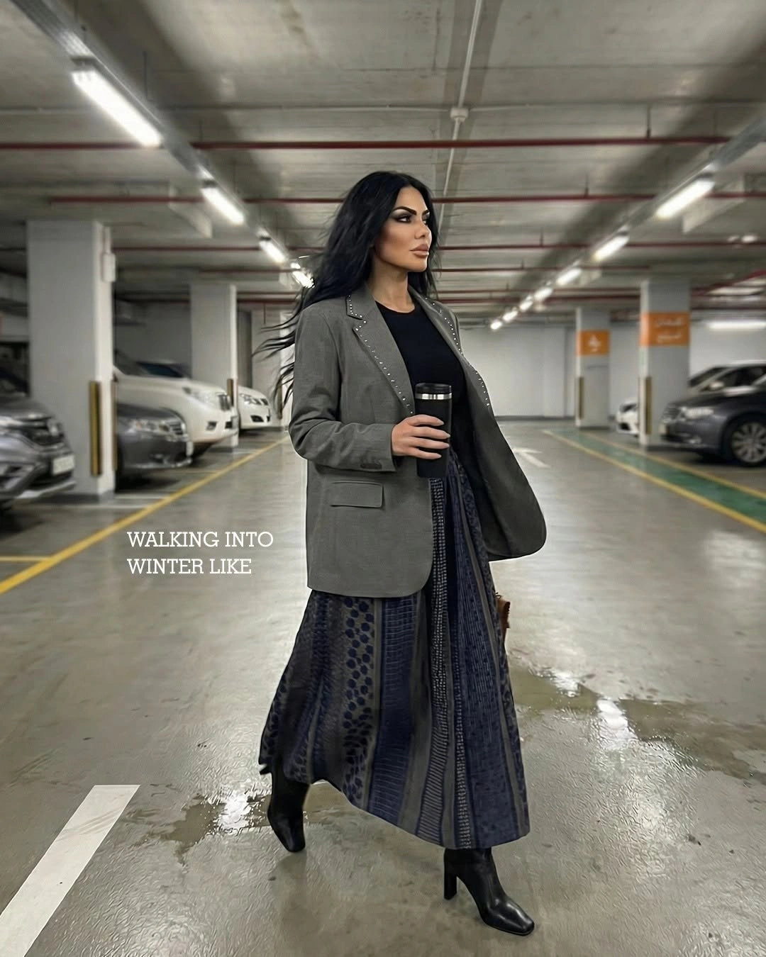 Muted olive blazer black top long charcoal skirt and pointed black boots