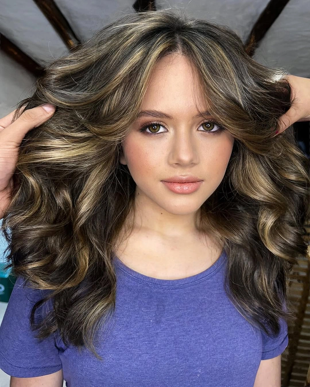 Dark brunette waves with caramel face-framing ribbons