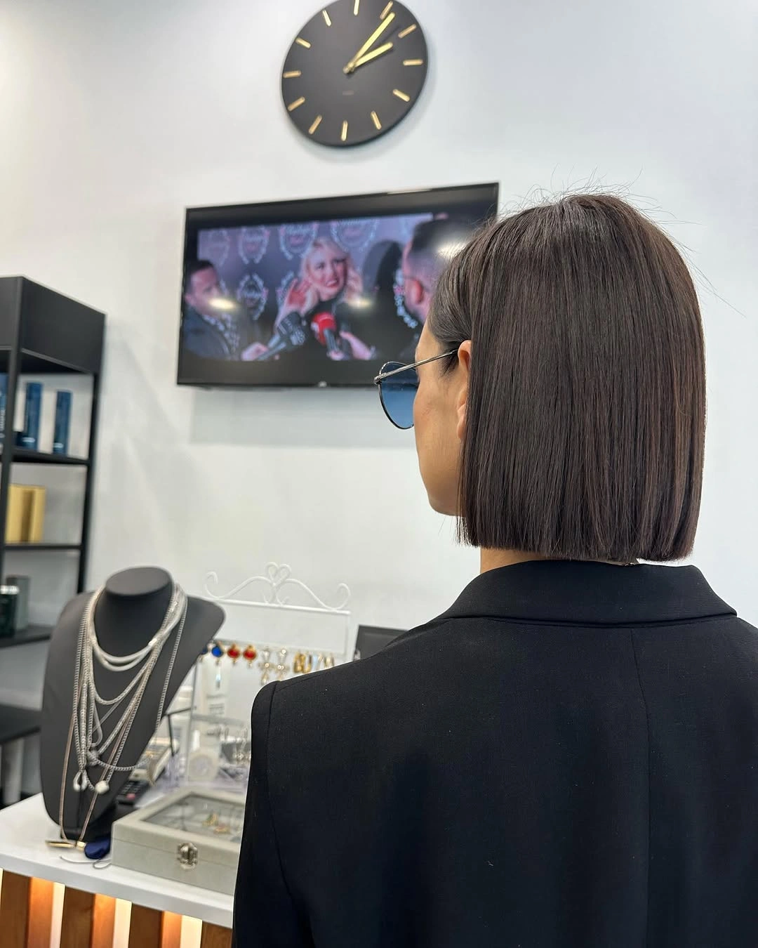 Short sleek espresso brunette bob seen from back