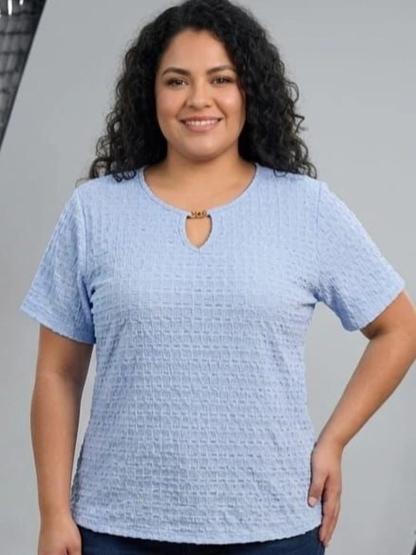 Long dark curls with center part and light blue top