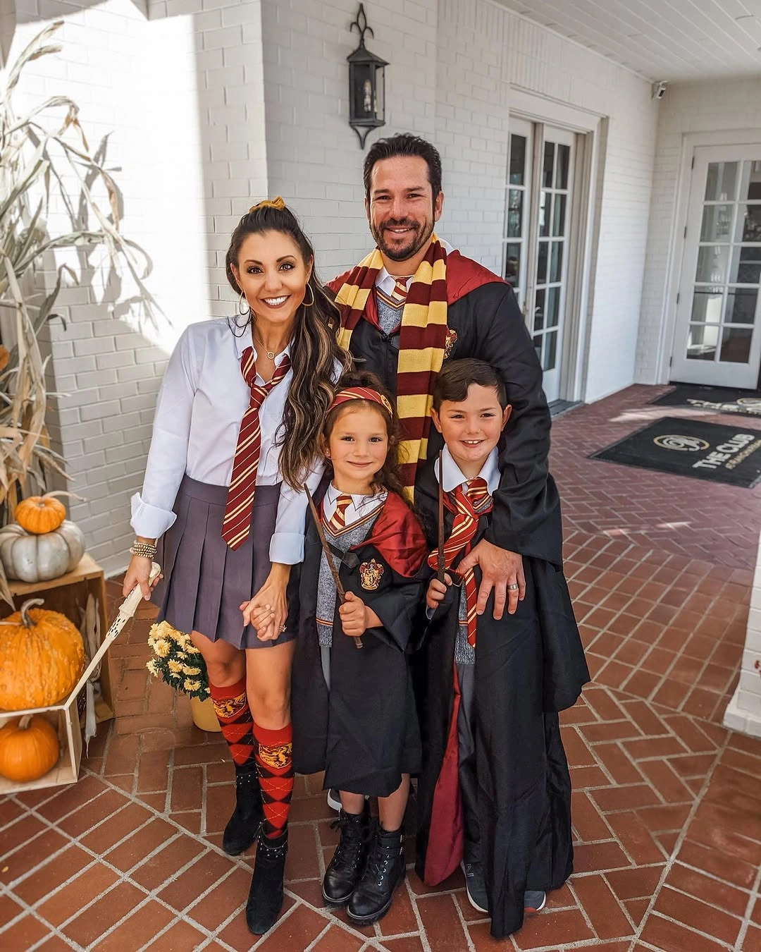 Family Halloween costumes with striped tie and maroon school-inspired outfits