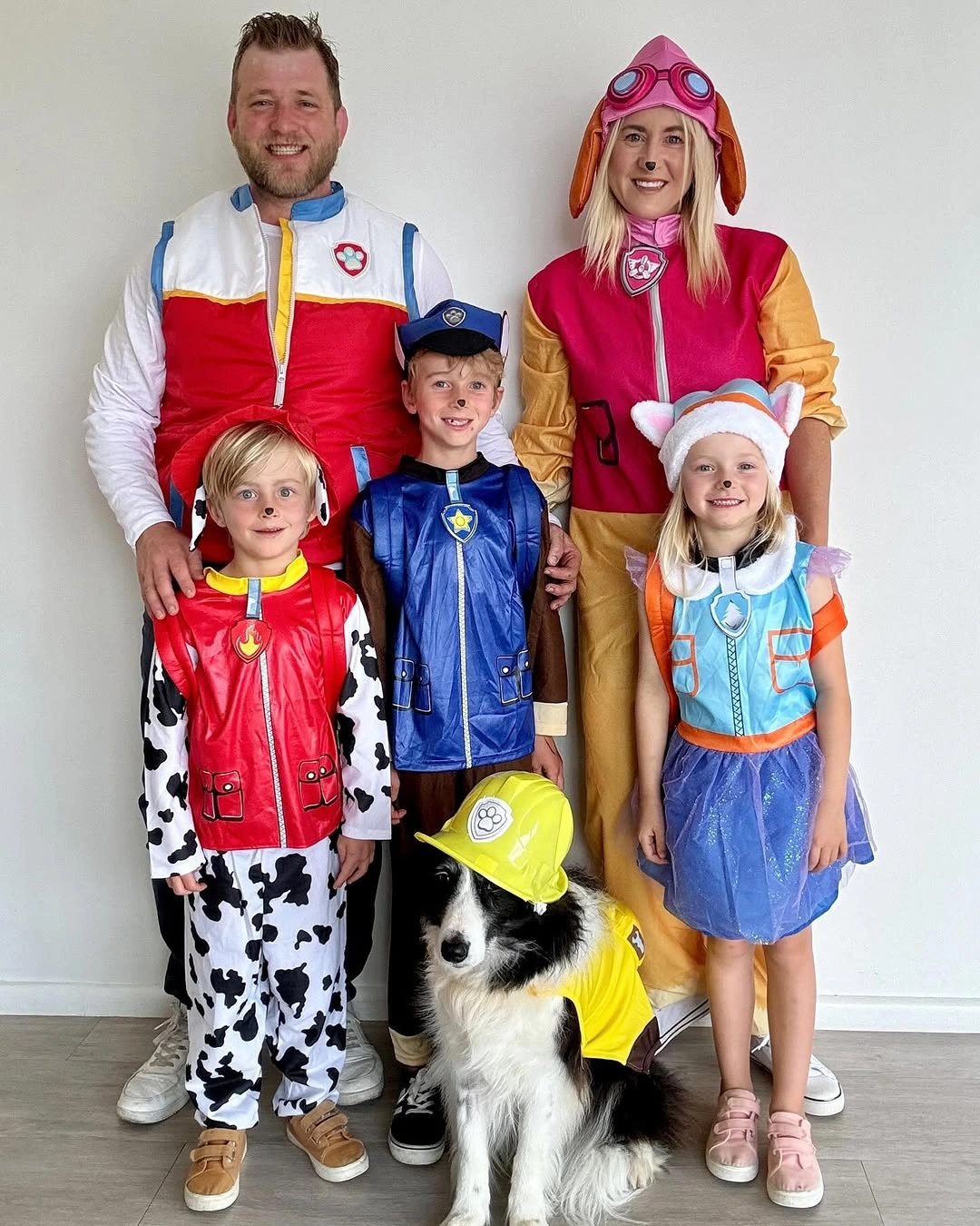 Family Halloween costumes with racing jacket police uniform and spotted dog