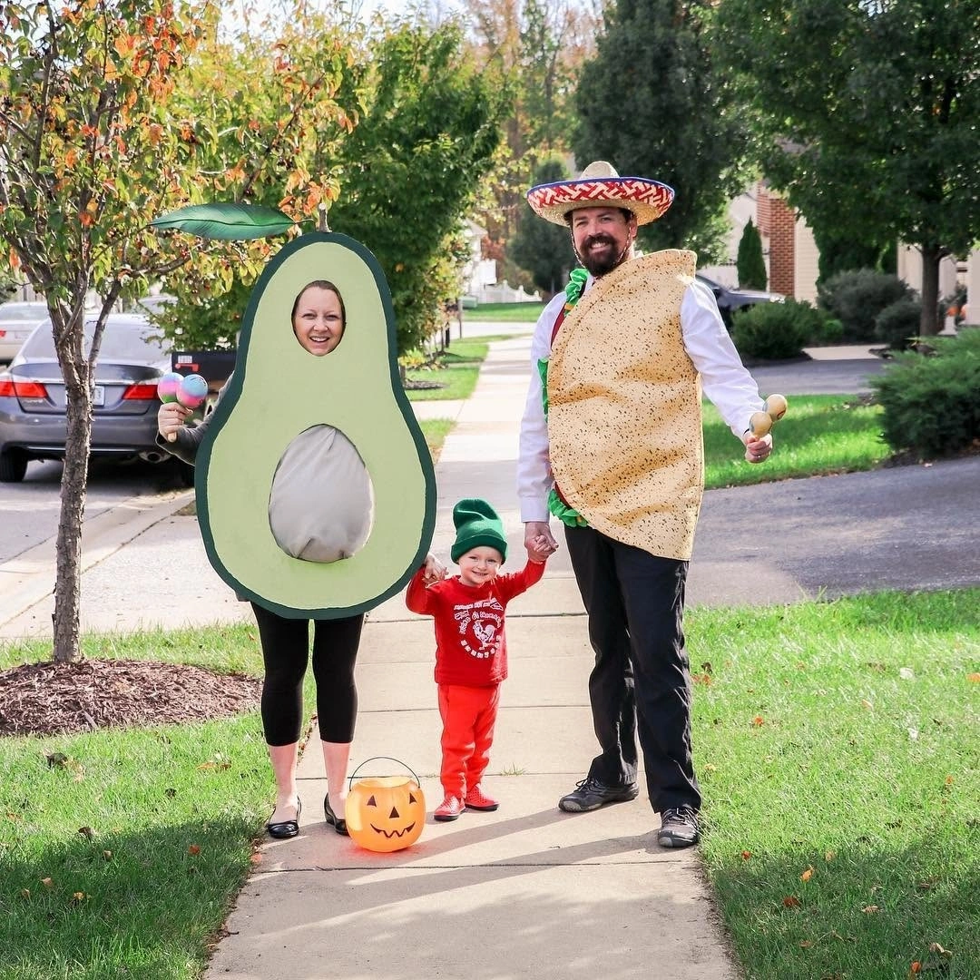 Playful family Halloween costumes with avocado and red toddler outfit