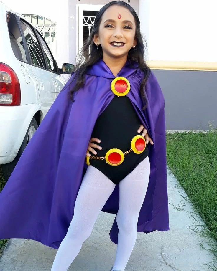 Purple cape comic-book Halloween costume with bold red yellow emblems