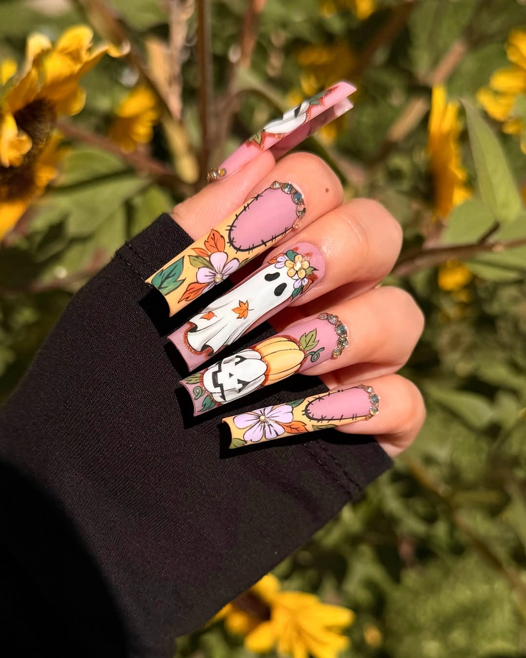 Long square nails with orange pumpkins flowers ghost and black outlines