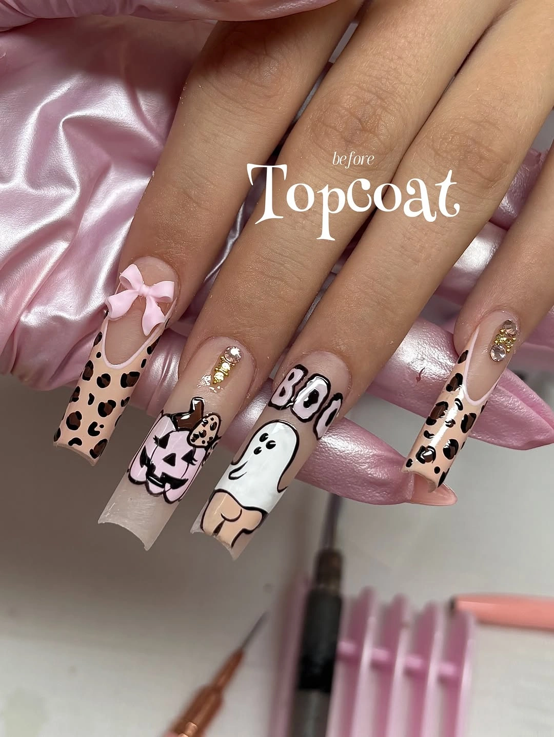 Long nude square nails with leopard print pink pumpkin and ghost