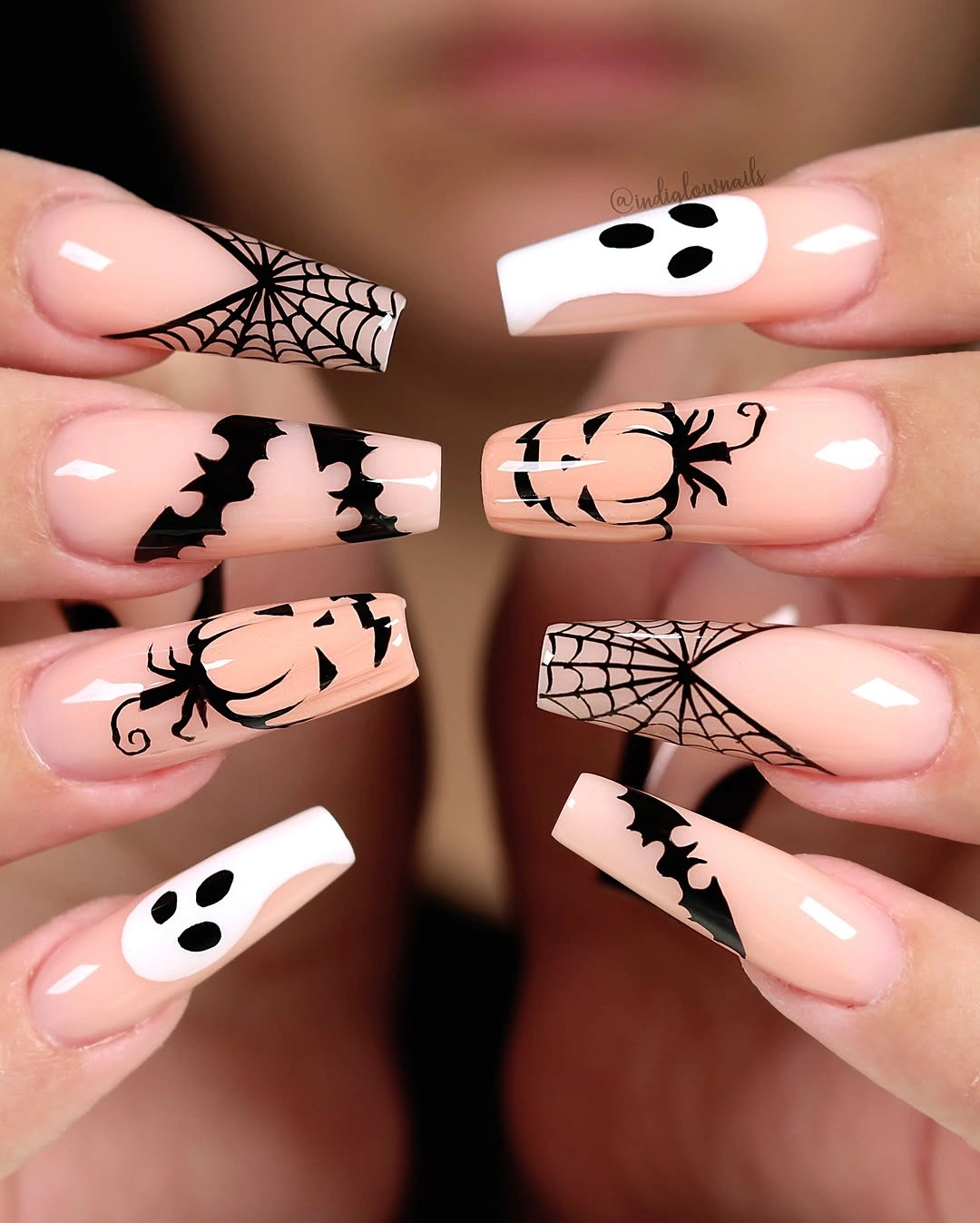 Long pale pink square Halloween nails with bats webs and ghost