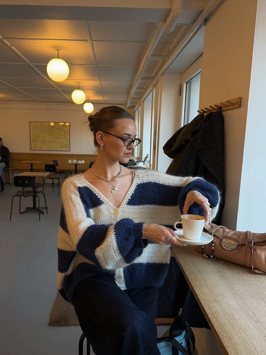 Striped fuzzy V-neck sweater with dark lower half