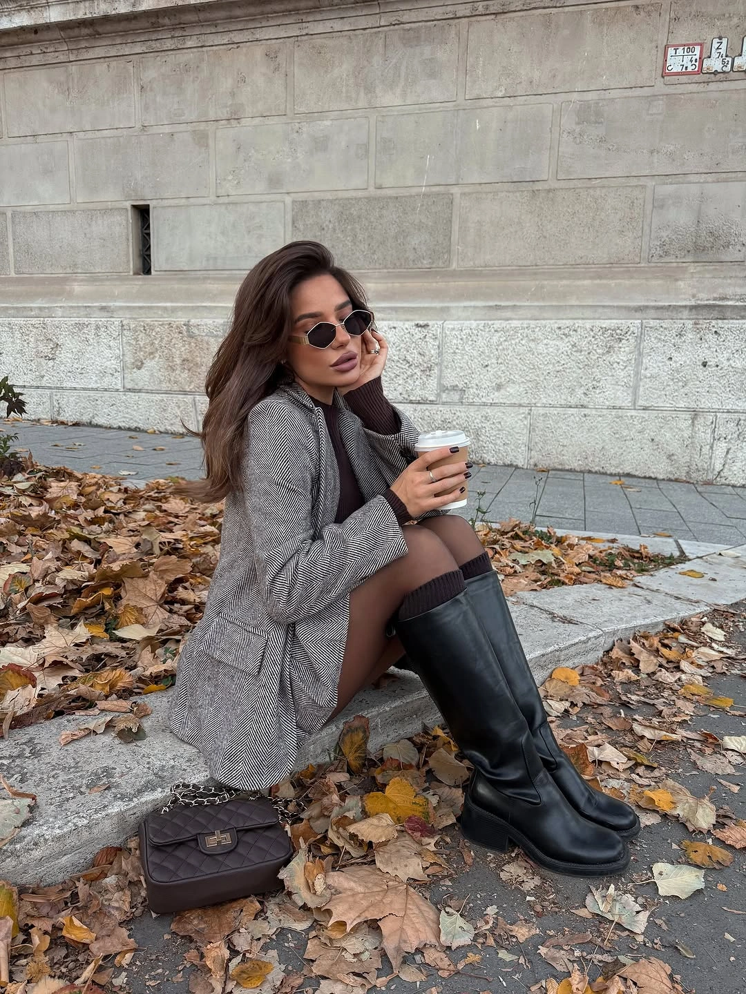 Gray tailored layer with sheer tights and tall black boots