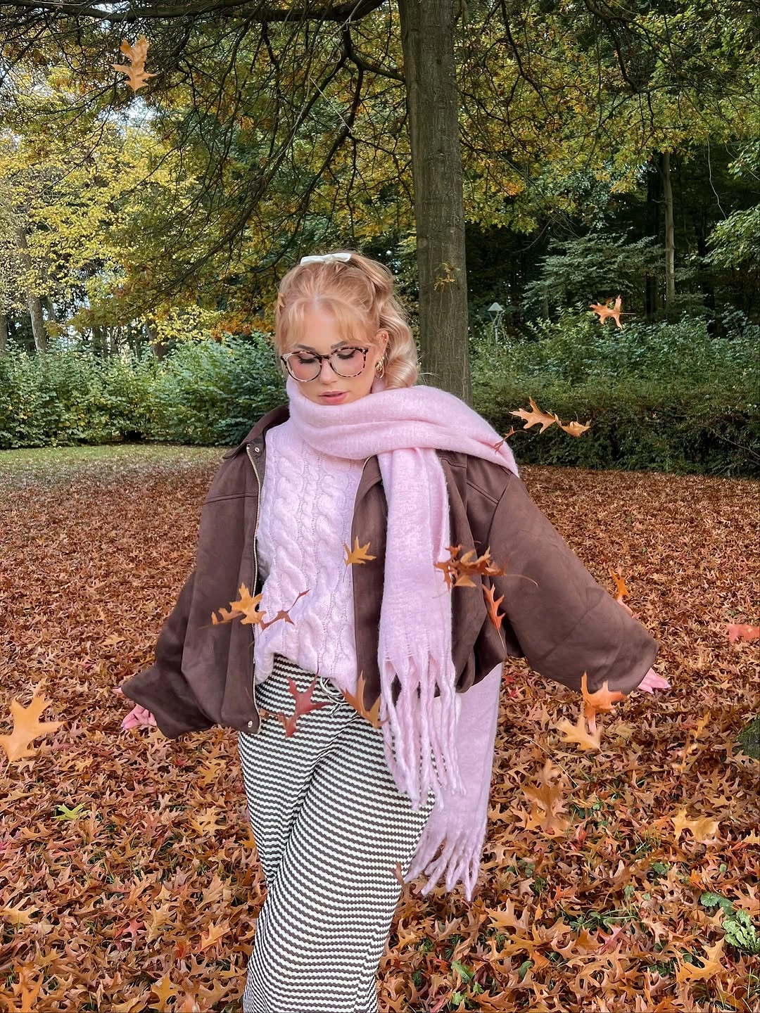 Brown jacket with pink scarf and striped long lower piece