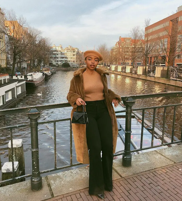 Faux Fur Coat with Ribbed Knit Sweater and Wide-Leg Pants — Winter Outfits for Black Girls