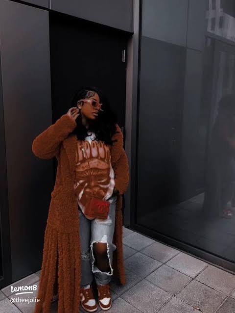 Rust Fuzzy Coat Over Graphic Tee and Distressed Jeans — Winter Outfits for Black Girls