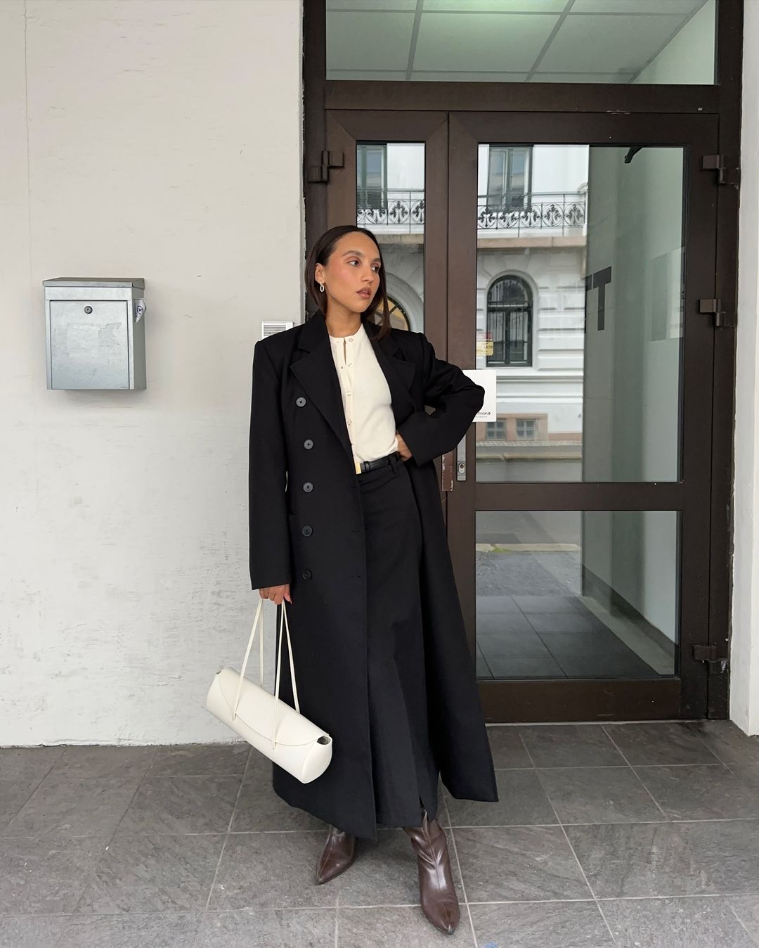 Black Double-Breasted Coat with Cream Cardigan — Winter Business Casual Outfits
