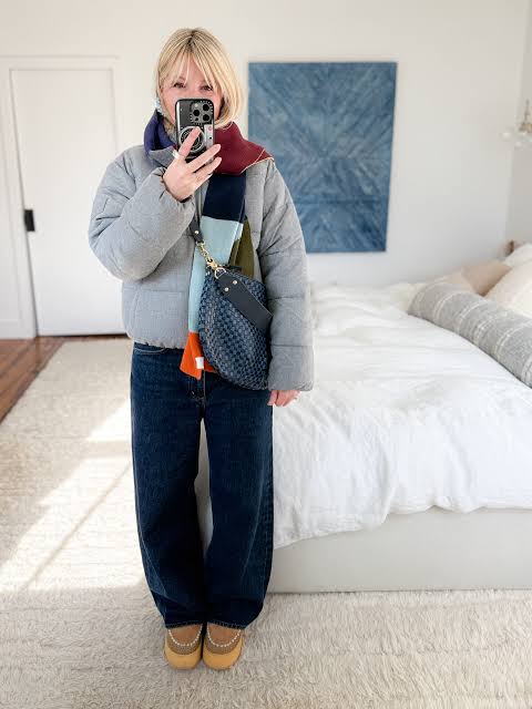 Grey Puffer Jacket and Colorful Scarf for Practical Travel — Winter Travel Outfits