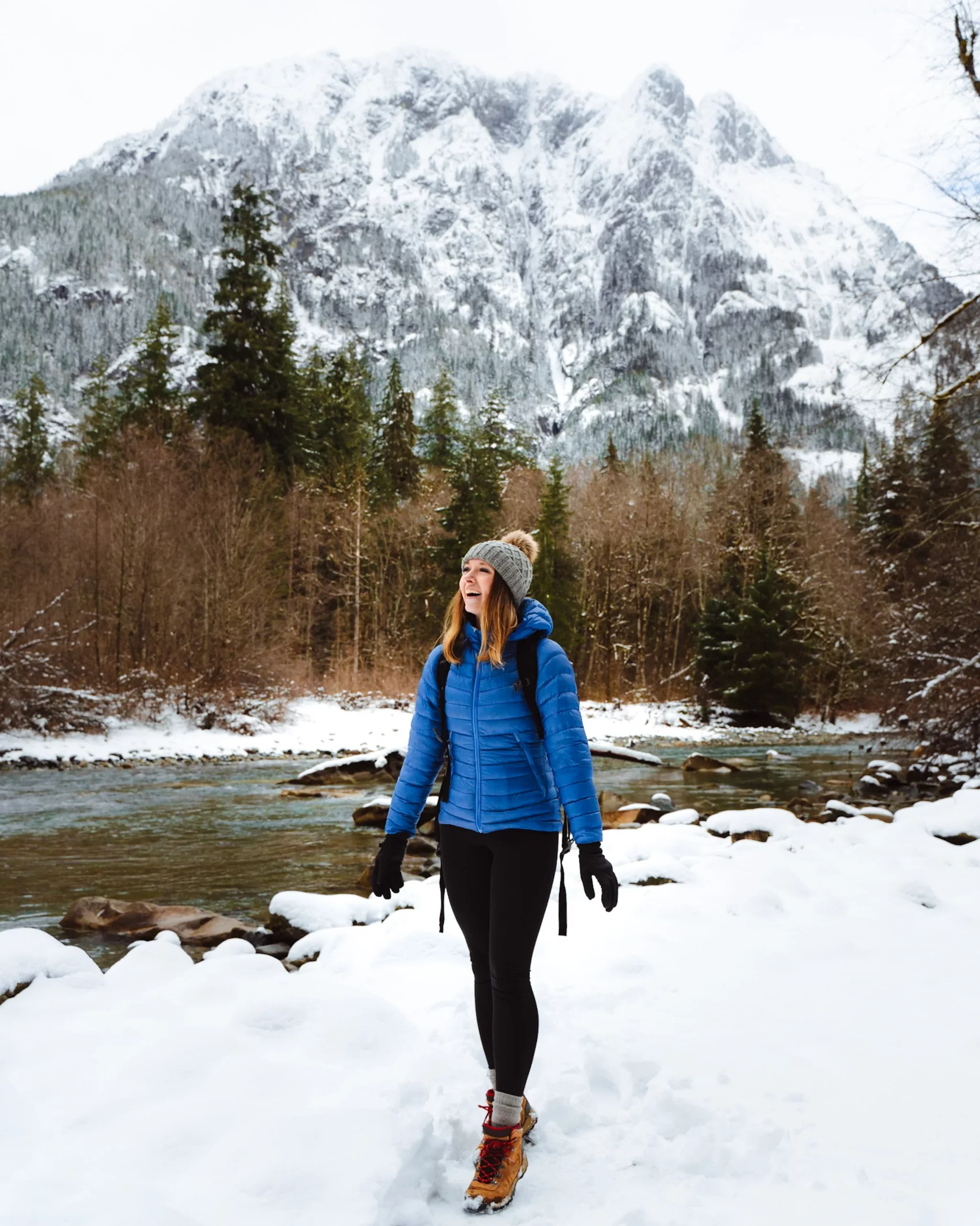 Vibrant Blue Puffer with Knit Beanie and Gloves — Winter Hiking Outfits