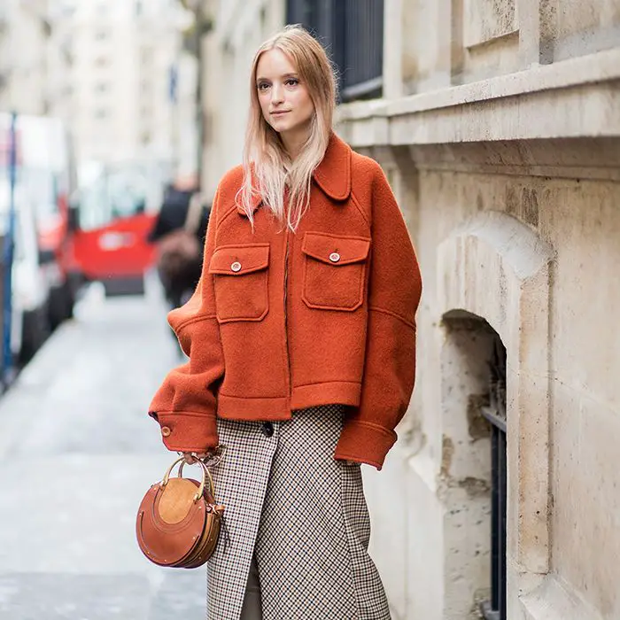 Oversized Orange Jacket and Plaid Skirt for a Bold Winter Look Oversized Orange Jacket and Plaid Skirt for a Bold Winter Look — Preppy Winter Outfits