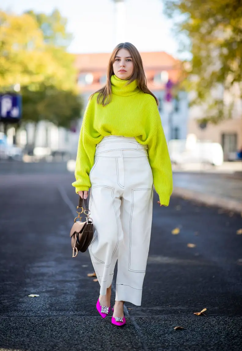 Bold Neon Sweater Paired with White Trousers for a Statement Bold Neon Sweater Paired with White Trousers for a Statement — Preppy Winter Outfits