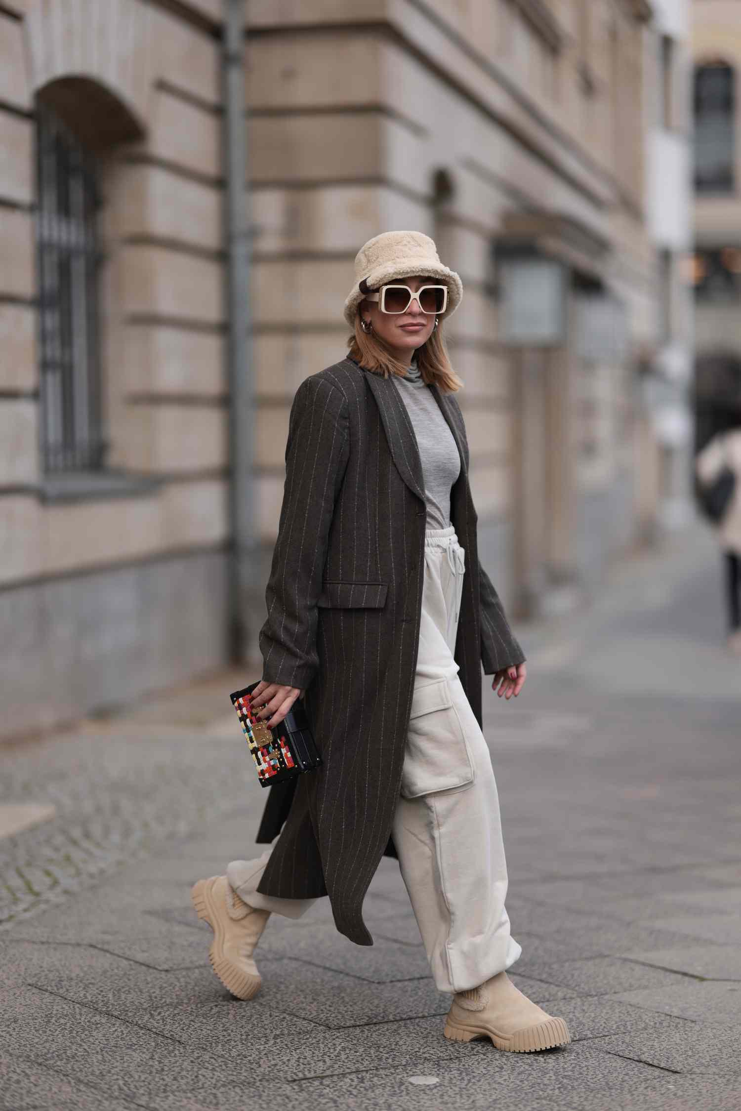 Chunky Beige Boots with Pinstripe Coat and Cargo Pants — Winter Boots Outfits