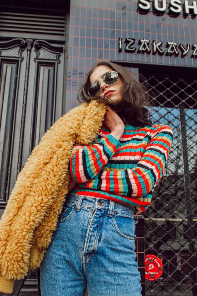Brightly Striped Sweater as the Focal Point with Blue Jeans — Colorful Winter Outfits