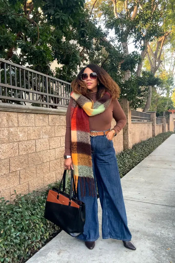 Oversized Plaid Scarf Elevates Brown Top and Wide-Leg Jeans — Colorful Winter Outfits