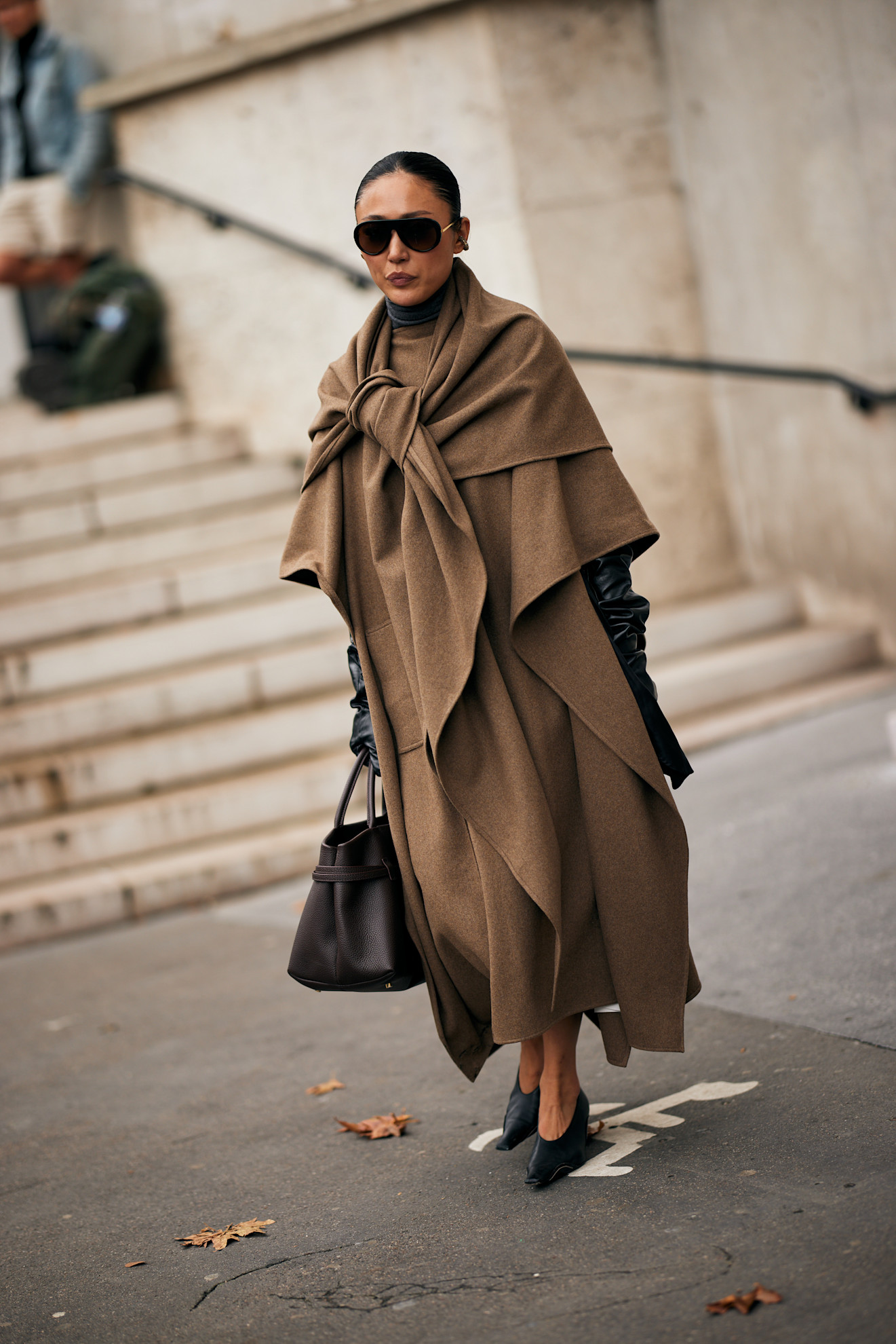 Dramatic Brown Cape Coat Over Black Turtleneck and Trousers — Winter Outfits for Older Women
